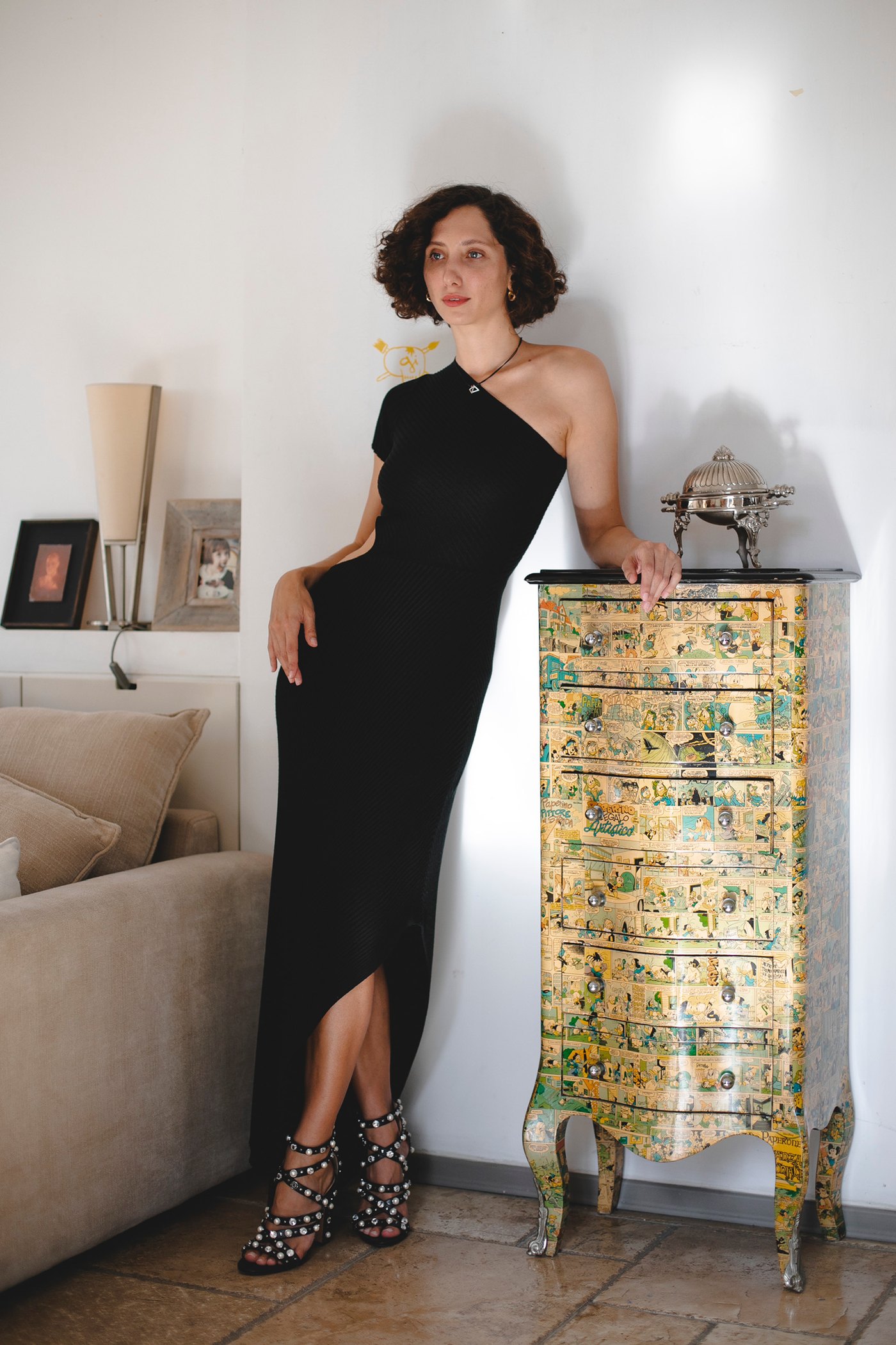 The black dress, indoors