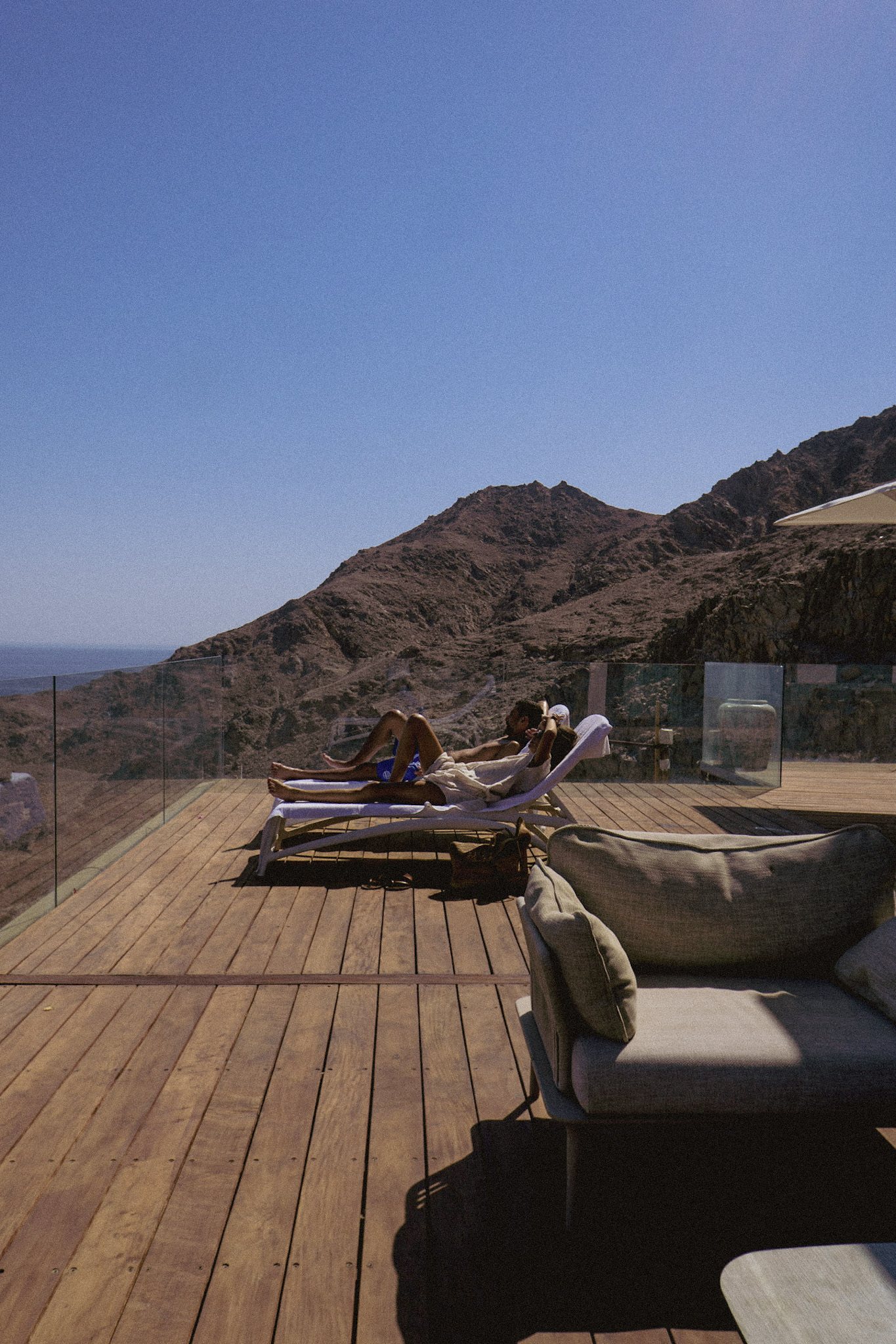 The deck, and the mountains across the water