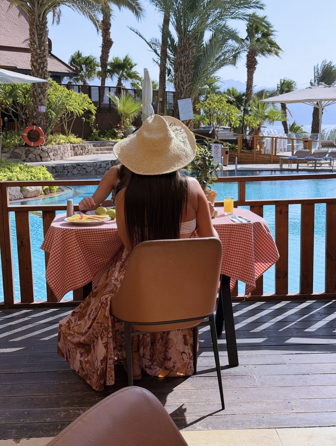 Lunch at a table beside the water
