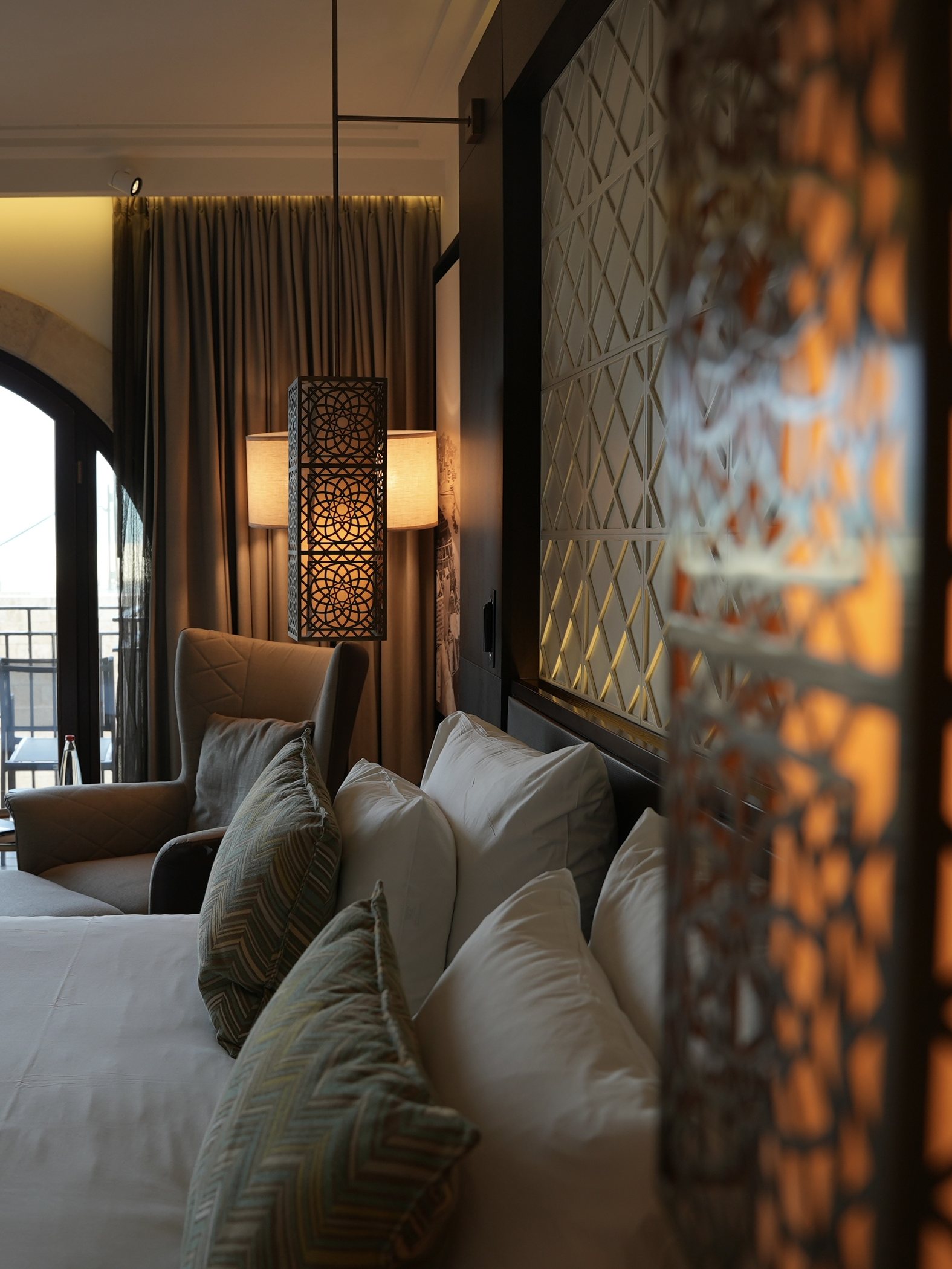 Cushions and the carved screen of a suite