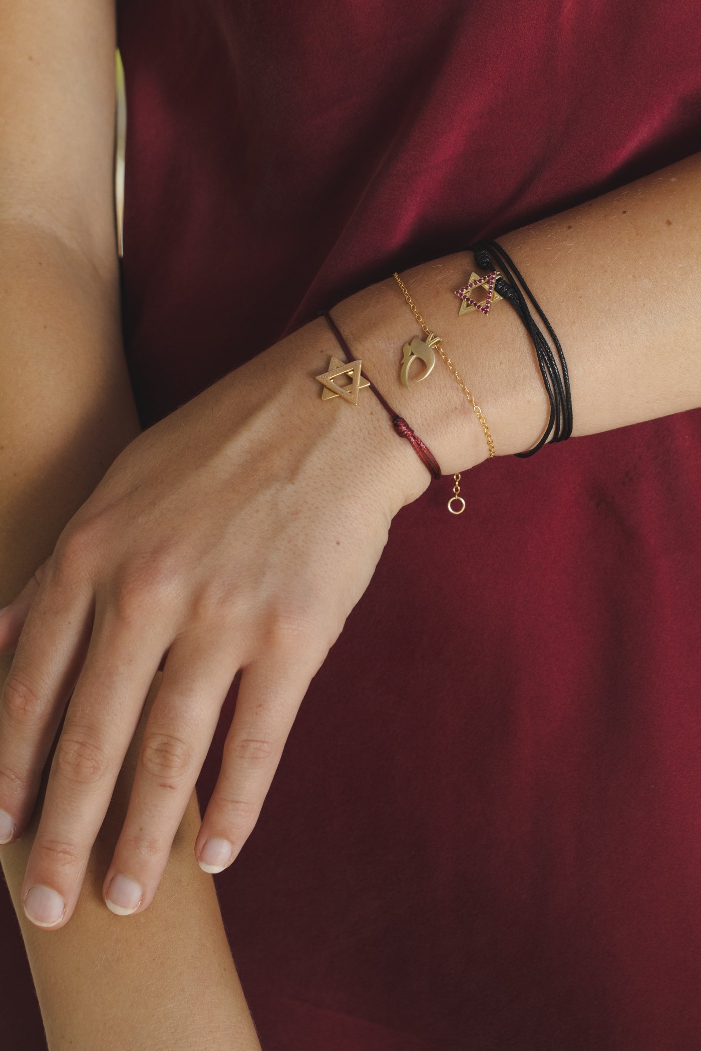 The bracelets at the wrist